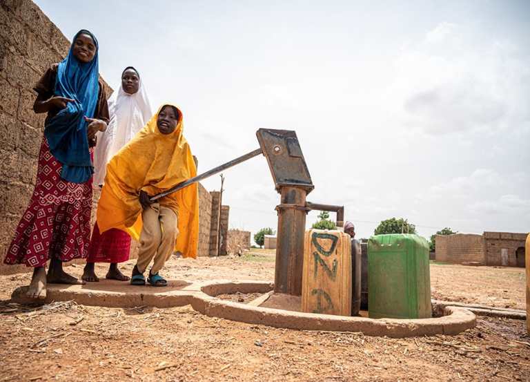 Children getting water from one of the newly sunk borehole in Nigeria