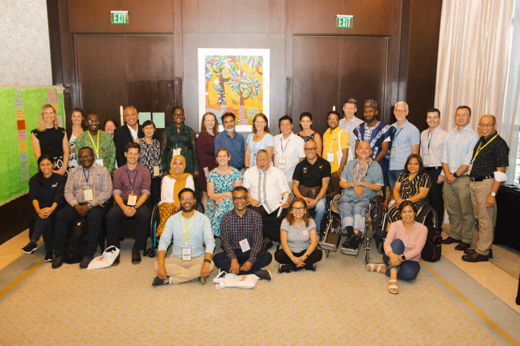 The Inclusion Advisory Group, together with CBM Global staff and partners, at a workshop in Manila.